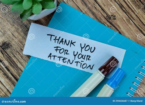 Concept Of Thank You For Your Attention Write On Sticky Notes Isolated On Wooden Table Stock