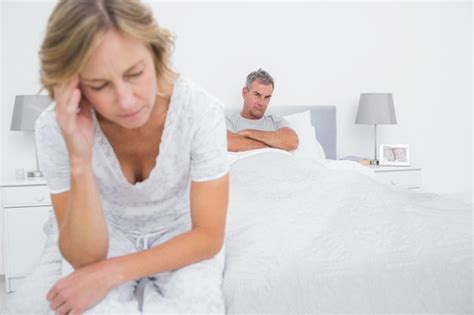 Premium Photo Couple Sitting On Different Sides Of Bed Not Talking