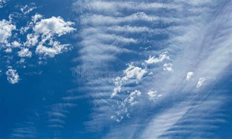 Cirrus and Stratus Clouds in Dramatic Blue Sky Over Cape Town Stock ...