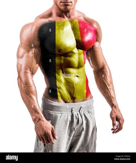Torso Of Shirtless Muscular Man With Belgium Flag Painted On Naked