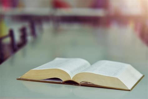 Open Book On The Table In Library 7235595 Stock Photo At Vecteezy