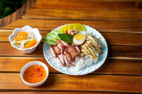 Premium Photo Delicious Khmer Grilled Pork Rice Bowl
