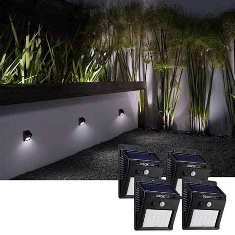 Torchstar 4 Pack Solar Stick Up Light Outdoor Solar Motion Detectors Light Solar Patio Lights