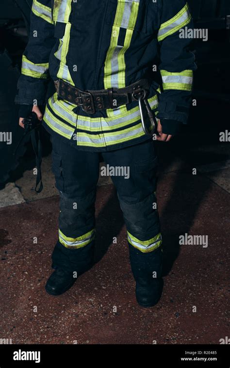 Partial View Of Firefighter With Portable Radio Set At Fire Department