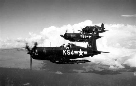 Asisbiz Vought F4U 1D Corsairs VBF 86 White K54 K64 And K65 On Patrol