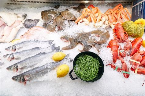 Premium Photo Frozen Seafood On Display In Ice