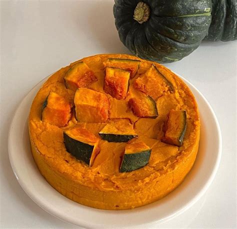 There Is A Cake That Has Been Decorated With Pumpkins And Squash On The