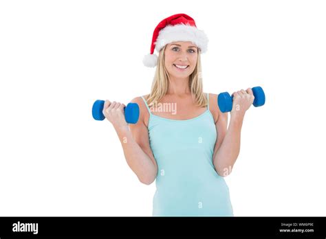 Festive Fit Blonde Holding Dumbbells On White Background Stock Photo