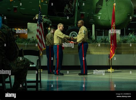 Col Rory Kent Left Presents Msgt Ralph Wright With An Award During Msgt Wright’s Retirement