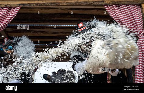 Waggis Costume Inside A Parade Float Throwing Confetti At The Basel