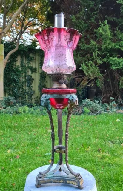 Solid Bronze Victorian Oil Lamp With Lions Heads Cranberry Shade Cut