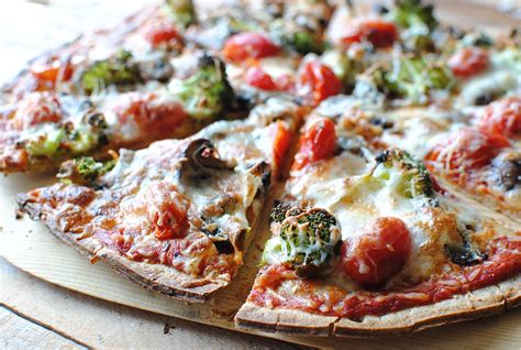 Thin Crust Pizza With Tomatoes Mushrooms And Broccoli Bev Cooks