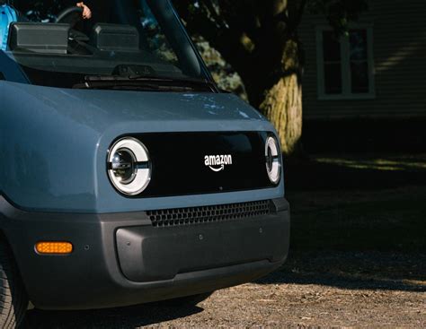 Amazon unveils its Rivian-made electric delivery van with cool interior ...