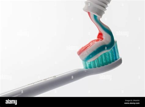 Toothpaste From Toothpaste Tube On Toothbrush Head Philips Sonicare
