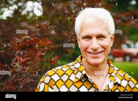 Portrait Of A Mature Man Smiling Stock Photo Alamy