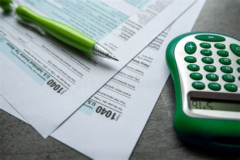 Individual Tax Return Forms With Pen Calculator Editorial