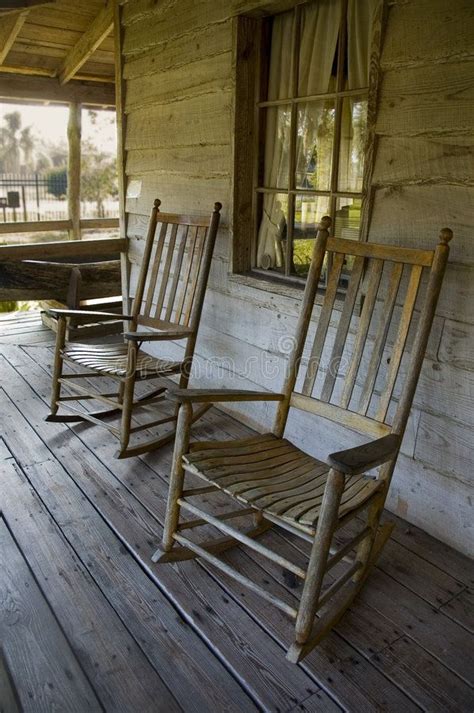 Two Old Rockers Two Rocking Chairs On The Front Porch Of An Old Home