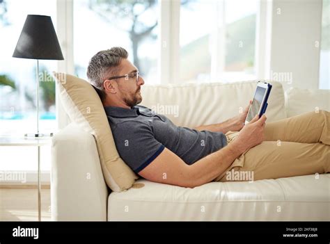 The Smart Way To Spend A Leave Day A Handsome Mature Man Relaxing On
