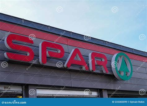 Spar Tree Logo And Round Sign On Supermarket Wall Facade Retailer Chain