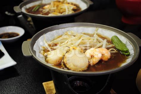 Japanese Seafood Hot Pot With Scallops And Shrimps Stock Photo