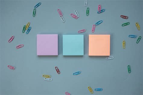 Stacks Of Post It Notes And Paper Clips · Free Stock Photo