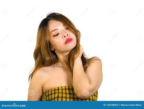 Portrait Of Young And Playful Asian Woman Posing Fresh And Naughty In