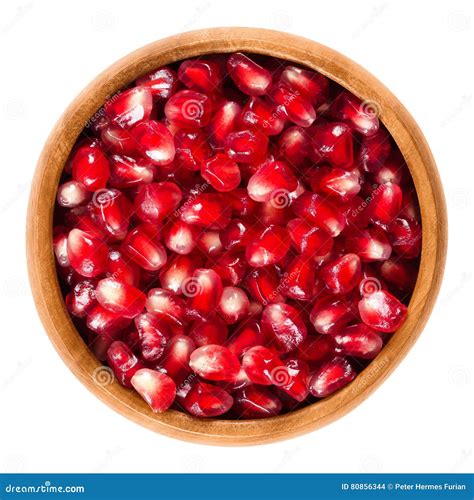 Fresh Pomegranate Seeds In Wooden Bowl Over White Stock Photo Image