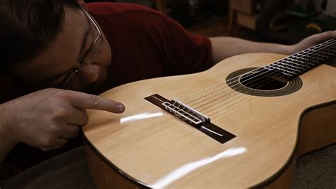 Restringing A Classical Guitar With A 12 Hole Bridge Pro Luthier Youtube