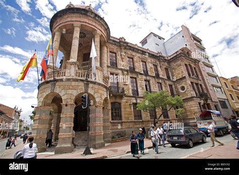 Official Stone Building With Flags Street Scene Cuenca Ecuador South