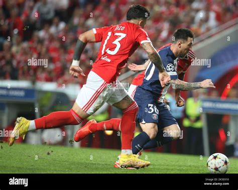 Lionel Messi Of Paris Saint Germain And Enzo Fernndez Of Benfica