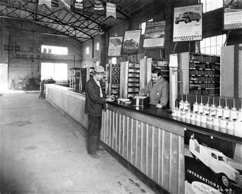 Customer At International Harvester Dealership Parts Desk Photograph