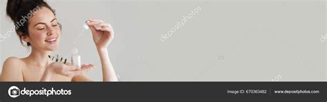 Half Naked Brunette Woman Showing Face Serum Eucalyptus Isolated While Stock Photo