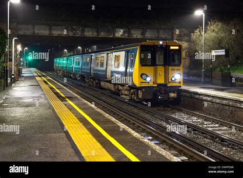 Merseyrail Class 507 Electric Train 507001 Calling At Wallasey Grove