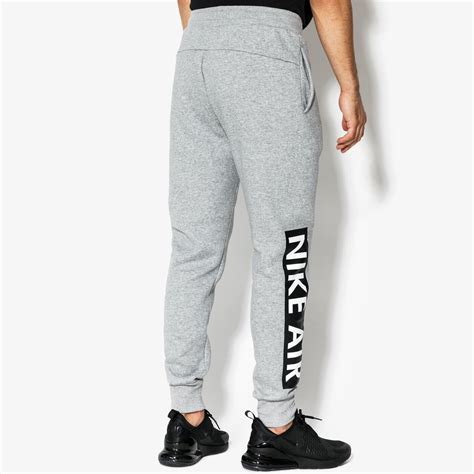 Nike Spodnie M Nsw Pant Flc Nike Air 928637 063 Kolor Szary Męskie