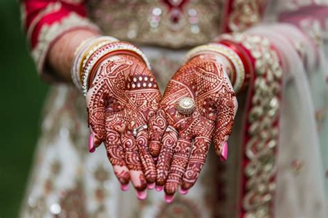 A Detailed Image Showing A Persons Hands Held Together Tight Stock