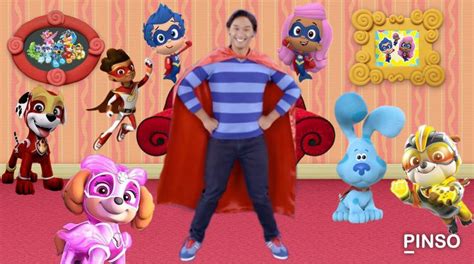 a man standing in front of some cartoon characters