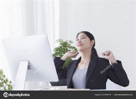 Young Asian Woman Sitting Desk Stretching Her Body Stock Photo By