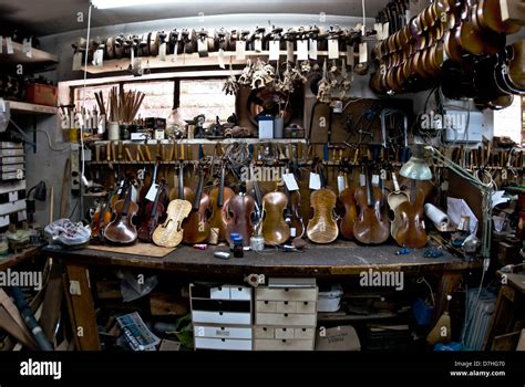 Violin repair workshop Stock Photo - Alamy