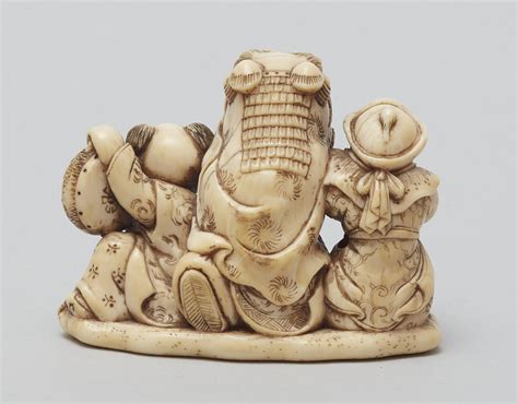 A Large Ivory Okimono Netsuke Of Three Karako At Shishimai By