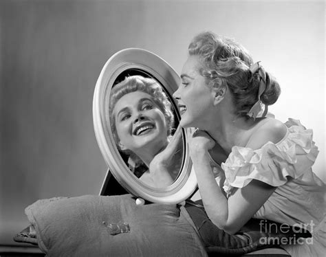 Woman Gazing At Her Reflection C 1950s Photograph By Debrocke Classicstock Fine Art America