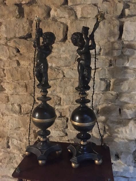 Proantic Pair Of Large Cast Iron Lamps With Putti Decor