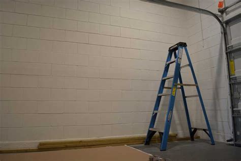 How To Frame Garage Walls Over Concrete Step By Step Garage Transformed