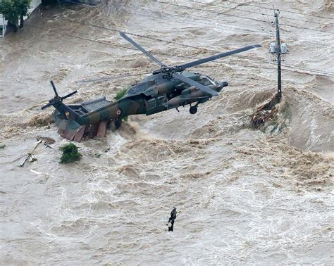 Hundreds Trapped As Floods Sweep Japan