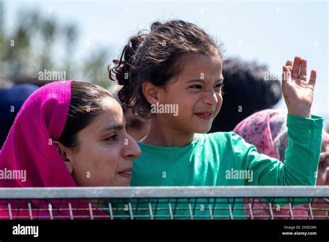 Srinagar India Th May A Kashmiri Girl Waves To Pilgrims As