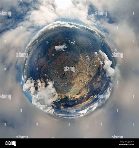 Aerial View From High Altitude Of Little Planet Earth Covered With