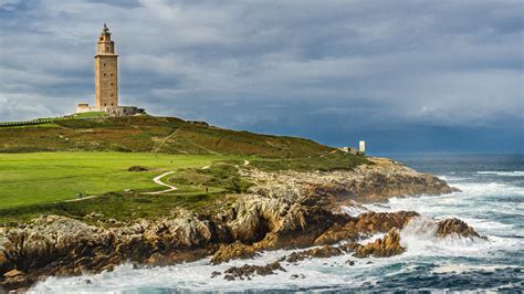 landscape Coruña Spain lighthouse Torre de Hercules sea clouds