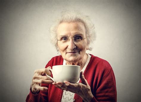 Premium Photo Old Lady Drinks Tea