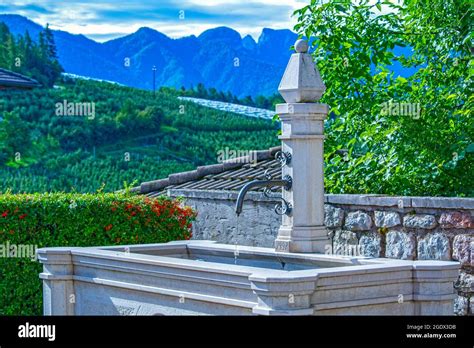 Public Drinking Potable Water Fountain In Italian Village In The Alps