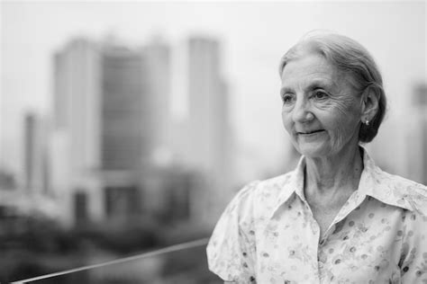 Premium Photo Portrait Of Smiling Woman In City