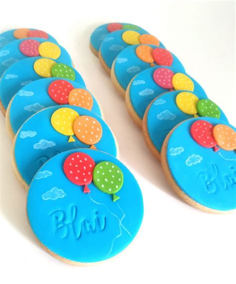 Decorated Cookies Are Arranged In The Shape Of Balloons